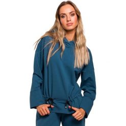 Bluza ze sznurkiem na dole - morska. Zielone bluzy damskie Moe, s, bez wzorów, z elastanu, bez rękawów, długie, z kapturem. Za 159,00 zł.