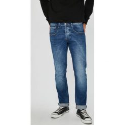 Guess Jeans - Jeansy Vermont. Niebieskie jeansy męskie slim marki Guess Jeans, z aplikacjami, z bawełny. W wyprzedaży za 249,90 zł.