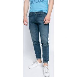 Calvin Klein Jeans - Jeansy Typhoon. Niebieskie jeansy męskie skinny marki Calvin Klein Jeans, z bawełny. W wyprzedaży za 299,90 zł.
