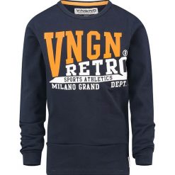 Koszulka "Jigelo" w kolorze granatowym. Niebieskie t-shirty chłopięce Vingino, z nadrukiem, z bawełny, bez rękawów. W wyprzedaży za 69,95 zł.