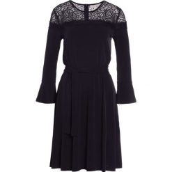 MICHAEL Michael Kors Sukienka z dżerseju black. Czarne sukienki damskie MICHAEL Michael Kors, m, bez wzorów, z elastanu, bez kołnierzyka, bez rękawów. W wyprzedaży za 409,50 zł.