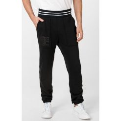 Converse Twisted Varsity Spodnie dresowe Czarny. Czarne spodnie męskie Converse, l, bez wzorów, z bawełny. Za 292,95 zł.