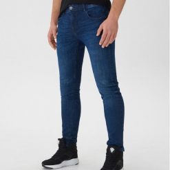 Jeansy slim fit - Granatowy. Niebieskie jeansy męskie House, m, bez wzorów. Za 139,99 zł.