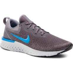 Buty NIKE - Odyssey React AO9819 008 Thunder Grey/Blue Hero. Szare buty sportowe męskie Nike, z tworzywa sztucznego, bez zapięcia, do biegania. W wyprzedaży za 439,00 zł.