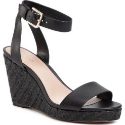 Espadryle ALDO - Unaliviel 60986721 96. Czarne espadryle damskie ALDO, bez wzorów, ze skóry ekologicznej, bez obcasa, na obcasie. W wyprzedaży za 199,00 zł.