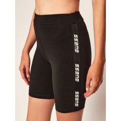 Szorty sportowe Guess O0BA01 KABR0. Czarne spodenki sportowe damskie Guess, s, z aplikacjami, sportowe. Za 169,00 zł.