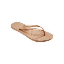 Japonki SLIM damskie. Pomarańczowe buty sportowe damskie marki Havaianas, z gumy, na średnim obcasie. W wyprzedaży za 59,99 zł.