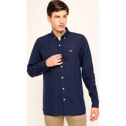 Koszula Lacoste CH4990. Niebieskie koszule męskie Lacoste, m, bez wzorów, ze lnu, casualowe, bez kołnierzyka, bez rękawów. W wyprzedaży za 289,00 zł.