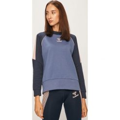 Hummel - Bluza. Fioletowe bluzy damskie Hummel, s, z nadrukiem, z elastanu, bez rękawów, bez kaptura. W wyprzedaży za 149,90 zł.