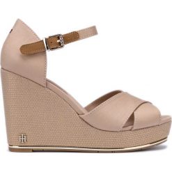 Tommy Hilfiger Buty wedge Brązowy Beżowy. Pomarańczowe koturny damskie TOMMY HILFIGER, bez obcasa, na koturnie, z paskami. Za 430,95 zł.