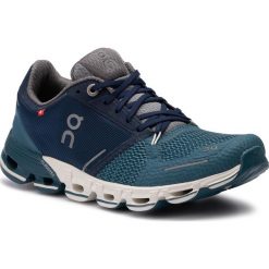 Buty ON - Cloudflyer W 000011 Storm/White 4418. Niebieskie buty sportowe damskie On, z materiału, sportowe, do biegania. W wyprzedaży za 519,00 zł.