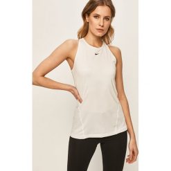 Nike - Top. Czerwone topy damskie Nike, s, bez wzorów, z elastanu, bez rękawów. Za 99,90 zł.