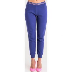 SPODNIE DRESOWE emporio armani ea7. Niebieskie spodnie damskie Emporio Armani, s, z dresówki. Za 314,10 zł.