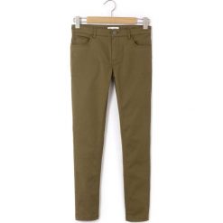 Spodnie slim, cygaretki. Brązowe rurki dziewczęce marki La Redoute Collections, z bawełny, z standardowym stanem. Za 62,96 zł.