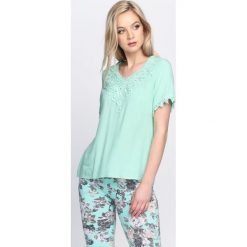 Miętowa Bluzka Burn It All. Zielone bluzki damskie marki Born2be, l. Za 39,99 zł.