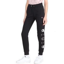Champion Spodnie dresowe Czarny. Czarne spodnie damskie Champion, l, z bawełny. Za 152,95 zł.