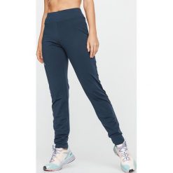 Spodnie Do Biegania Damskie Run Warm. Niebieskie spodnie damskie KALENJI, m, bez wzorów, z elastanu, do biegania. Za 79,99 zł.