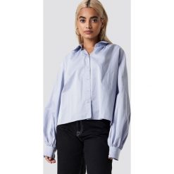 NA-KD Trend Koszula Volume Sleeve - Blue. Niebieskie koszule wiązane damskie NA-KD Trend, z krótkim rękawem. Za 121,95 zł.