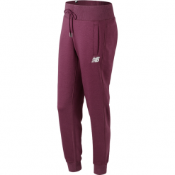 New Balance WP73535WNS. Brązowe spodnie dresowe damskie New Balance, z jedwabiu. Za 149,99 zł.