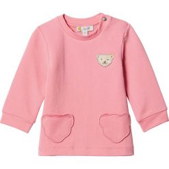 Bluza w kolorze jansoróżowym. Różowe bluzy niemowlęce Steiff, z aplikacjami, bez rękawów, bez kaptura. W wyprzedaży za 59,95 zł.