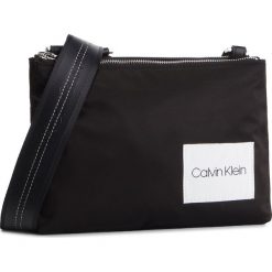 Torebka CALVIN KLEIN - Soft Line Crossbody K60K605010 001. Czarne listonoszki damskie Calvin Klein, bez wzorów, z materiału, bez dodatków. W wyprzedaży za 259,00 zł.