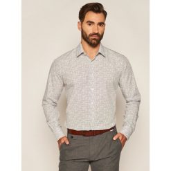 Koszula KARL LAGERFELD 605000 502688. Białe koszule męskie KARL LAGERFELD, m, bez wzorów, casualowe, bez kołnierzyka, bez rękawów. Za 589,00 zł.