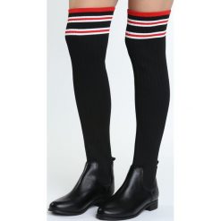Czarne Kozaki Verity. Czarne kozaki damskie Born2be, bez obcasa, na płaskiej podeszwie, bez zapięcia. Za 119,99 zł.