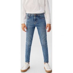 Mango Kids - Jeansy dziecięce Skinny 110-164 cm. Niebieskie spodnie chłopięce Mango Kids, bez wzorów, z elastanu. Za 89,90 zł.