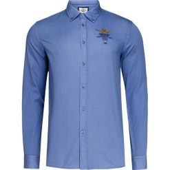 Koszula AERONAUTICA MILITARE Niebieski. Niebieskie koszule męskie marki Aeronautica Militare, z haftami, biznesowe, z włoskim kołnierzykiem. Za 336,00 zł.