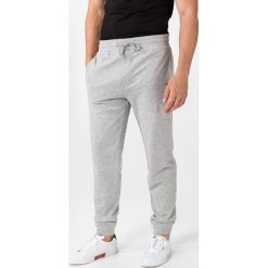 Tommy Hilfiger Spodnie dresowe Szary. Szare spodnie męskie TOMMY HILFIGER, s, bez wzorów, z bawełny. Za 280,95 zł.