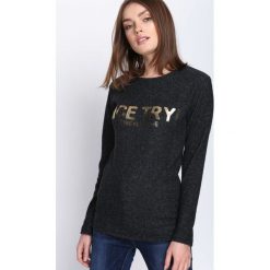 Czarna Bluzka Sameness. Czarne bluzki longsleeves Born2be, l, z nadrukiem, z okrągłym kołnierzem. Za 34,99 zł.