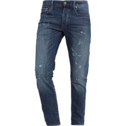 GStar Jeansy Slim Fit trender ultimate denim. Niebieskie jeansy męskie regular G-Star, z bawełny. Za 609,00 zł.