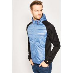 Kurtka przejściowa Tommy Sport Hybrid S20S200301. Niebieskie kurtki sportowe męskie Tommy Sport, s, bez wzorów, z poliesteru, bez kaptura. W wyprzedaży za 539,00 zł.