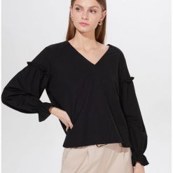Bluzka z falbanami - Czarny. Czarne bluzki damskie Mohito, s. Za 69,99 zł.