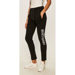 Roberto Cavalli Sport - Spodnie. Czarne spodnie damskie Roberto Cavalli Sport, s, bez wzorów, z tkaniny. Za 619,90 zł.