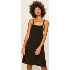 Calvin Klein - Sukienka plażowa. Czarne stroje kąpielowe damskie Calvin Klein, na co dzień, xs, bez wzorów, z wiskozy, z okrągłym kołnierzem, bez rękawów, proste. W wyprzedaży za 229,90 zł.