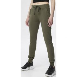 Khaki Spodnie Dresowe Alcithylia. Brązowe spodnie damskie Born2be, s, z dzianiny. Za 69,99 zł.