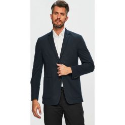 Calvin Klein - Marynarka. Niebieskie garnitury męskie Calvin Klein, bez wzorów, z elastanu. W wyprzedaży za 759,90 zł.