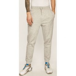Tommy Jeans - Spodnie. Niebieskie spodnie męskie Tommy Jeans, na co dzień, s, bez wzorów, z elastanu. Za 359,90 zł.
