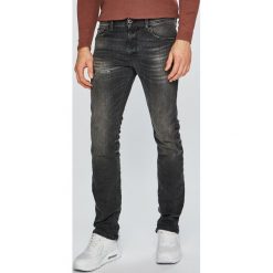 Diesel - Jeansy Thommer. Szare jeansy męskie marki Diesel, z elastanu. Za 869,90 zł.