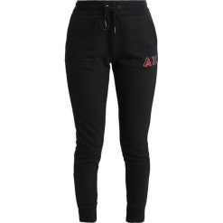 Bryczesy damskie: Armani Exchange Spodnie treningowe black