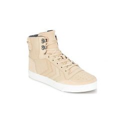 Buty Hummel STADIL WINTER. Brązowe trampki i tenisówki damskie Hummel, bez wzorów, bez zapięcia. Za 383,20 zł.