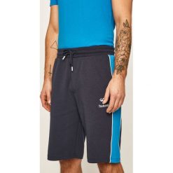 Hummel - Szorty. Czarne spodenki sportowe męskie Hummel, s, bez wzorów, z elastanu, sportowe. W wyprzedaży za 129,90 zł.