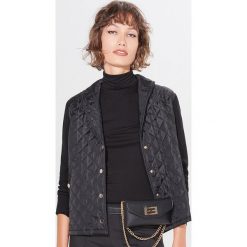 Pikowana bluza z łączonych materiałów - Czarny. Czarne bluzy damskie Mohito, s, bez wzorów, z materiału, bez rękawów, bez kaptura. Za 159,99 zł.