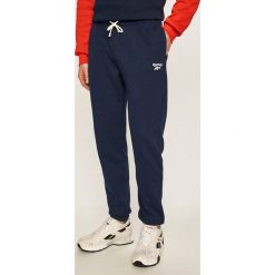 Reebok - Spodnie. Niebieskie spodnie męskie Reebok, xl, z bawełny, sportowe. Za 159,90 zł.