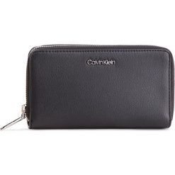 Duży Portfel Damski CALVIN KLEIN - Stitch Double Ziparound K6K604864 Black 001. Czarne portfele damskie Calvin Klein, ze skóry ekologicznej. Za 299,00 zł.