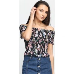 Czarna Bluzka Wild Child. Czarne bluzki damskie Born2be, s, z aplikacjami, bez kołnierzyka, z krótkim rękawem. Za 79,99 zł.