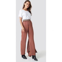 NA-KD Spodnie z nadrukiem - Multicolor. Szare spodnie damskie NA-KD, z poliesteru. Za 161,95 zł.