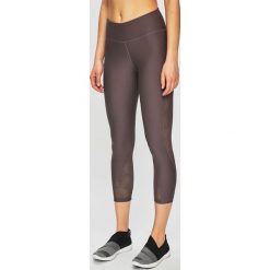 Under Armour - Legginsy. Fioletowe spodnie damskie Under Armour, s, z elastanu. W wyprzedaży za 139,90 zł.
