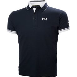 Koszulka funkcyjna "Shore" w kolorze granatowym. Niebieskie koszulki męskie Helly Hansen, s, bez wzorów, z materiału, polo, bez rękawów. W wyprzedaży za 130,95 zł.